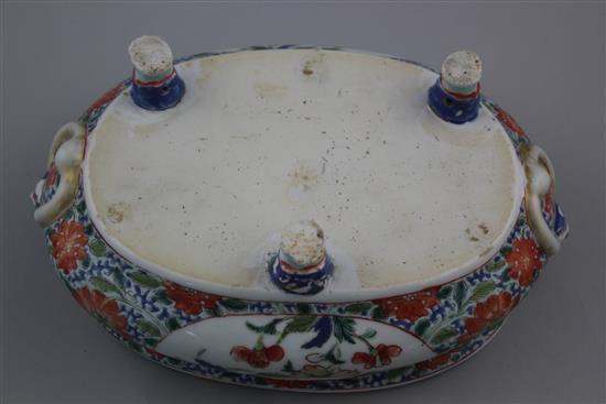 A rare and unusual Chinese Export famille verte oval desk stand, early 18th century, 25.5cm, one foot repaired